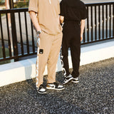 TG LINE TUCK PANTS / WOMEN